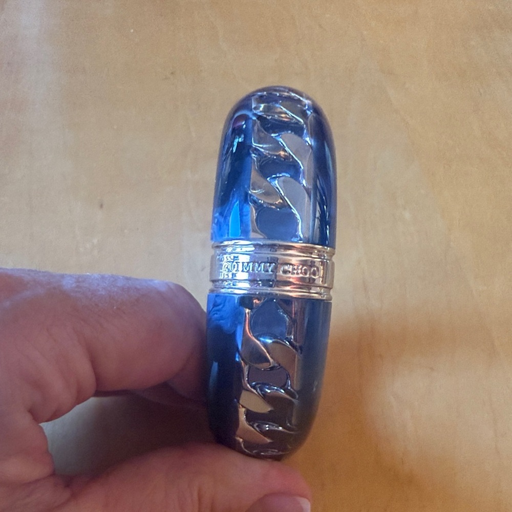 Jimmy Choo blue lucite/gold chain bangle.
